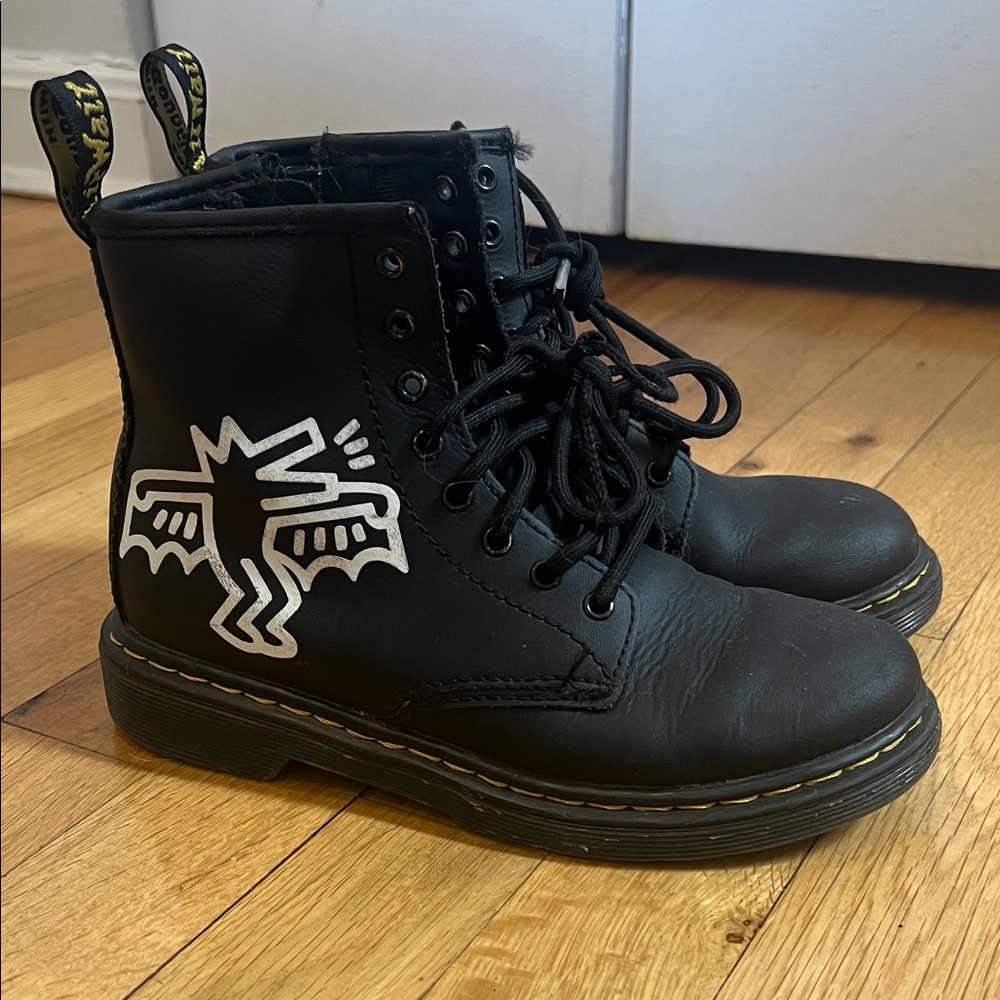Dr. Martens 1460 Keith Haring Kid’s Black Hydro Leather Lace Up Boot